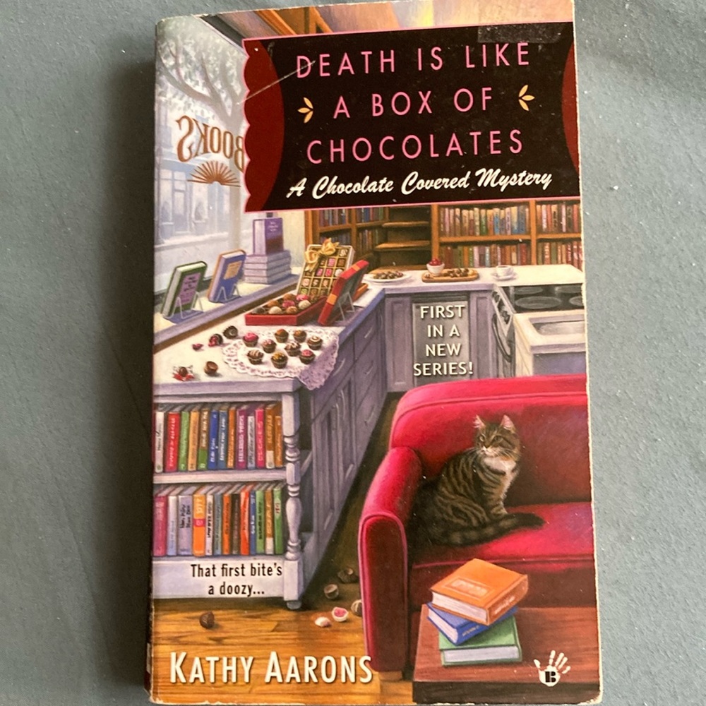 Death Is Like A Box Of Chocolates by Kathy Aarons